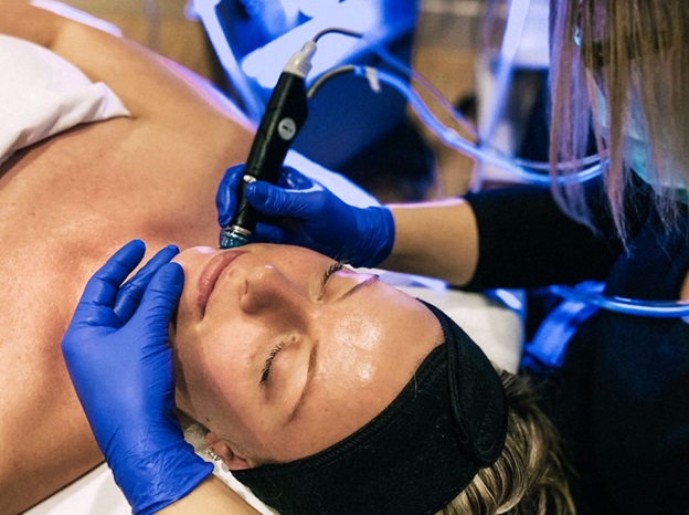 Woman getting a HydraFacial facial treatment